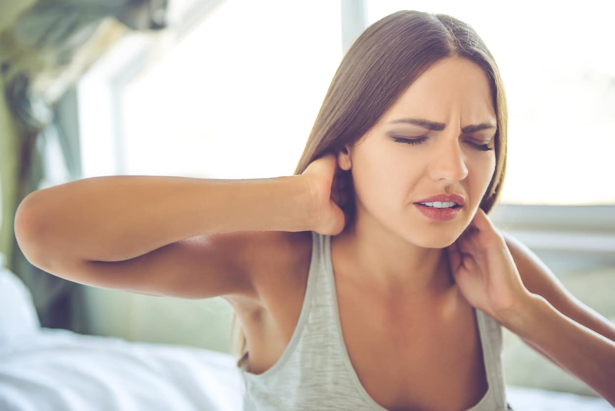 Image of woman with Neck Pain in need of Neck Pain Relief Therapy.