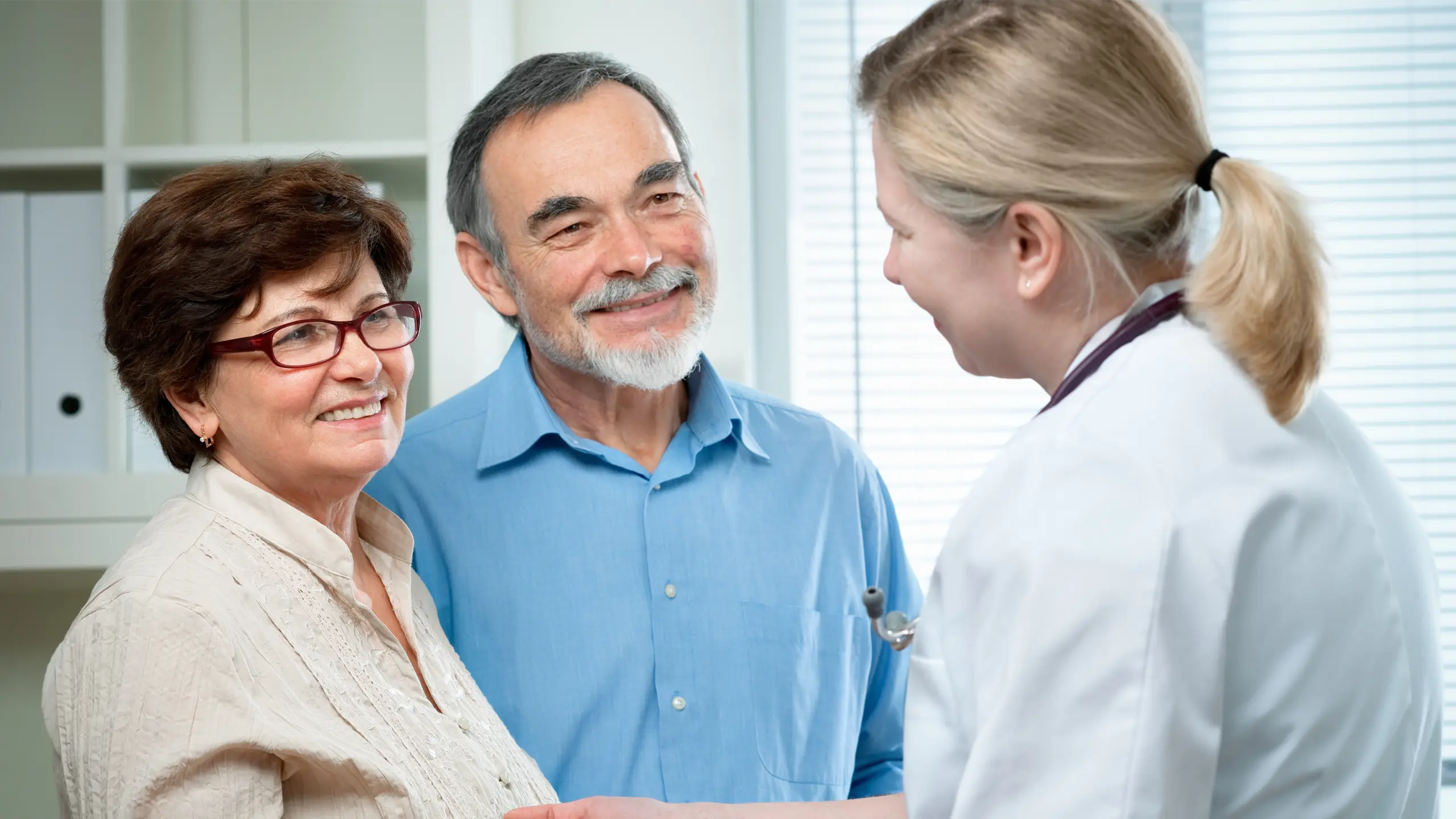 a couple at a consultation with a medical professional