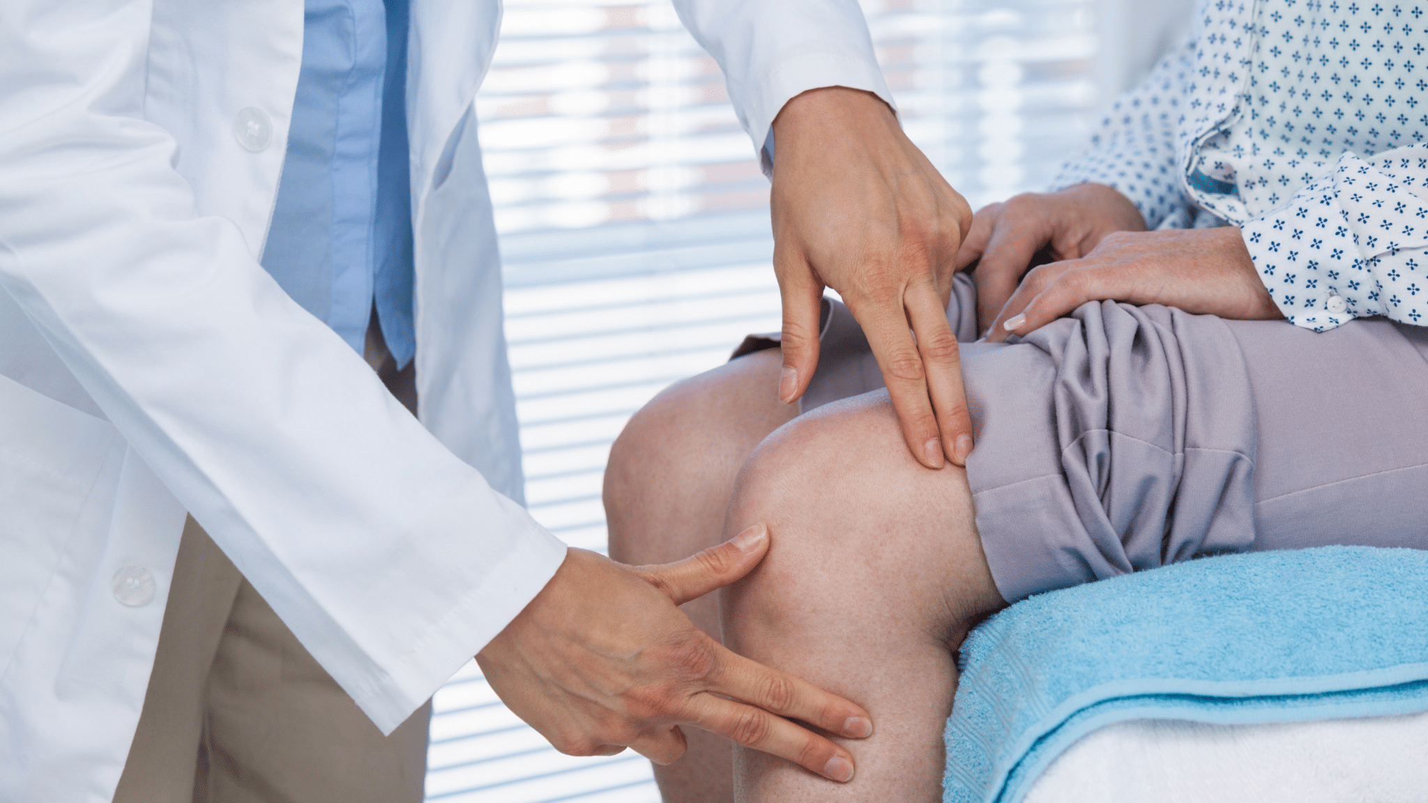 Doctor examining a patient's knee