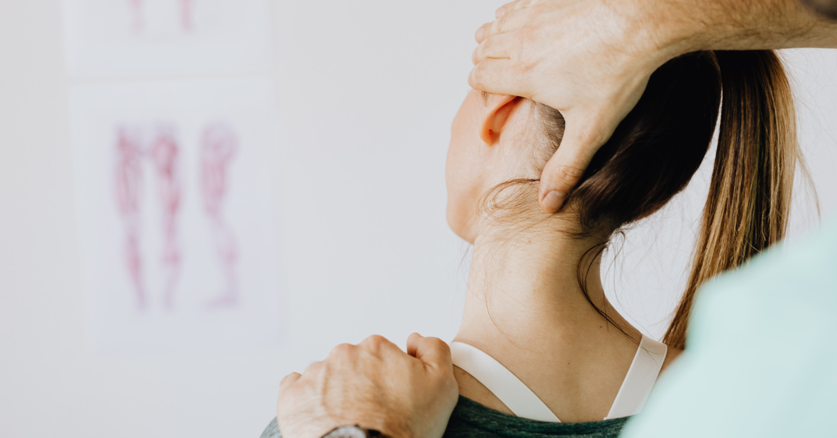 woman having neck stretched for pain