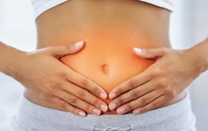 person holding stomach